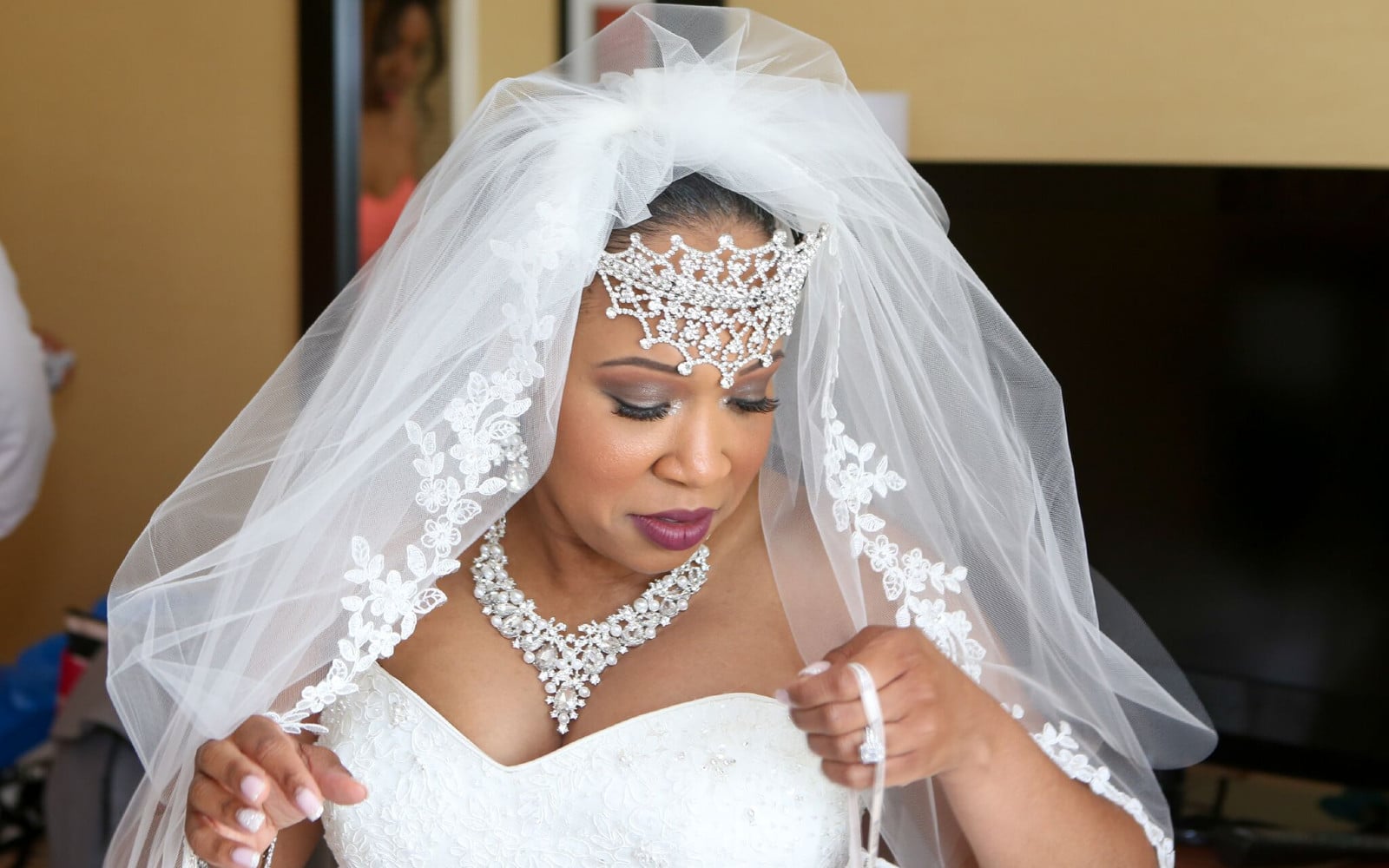 Bride picks up dress